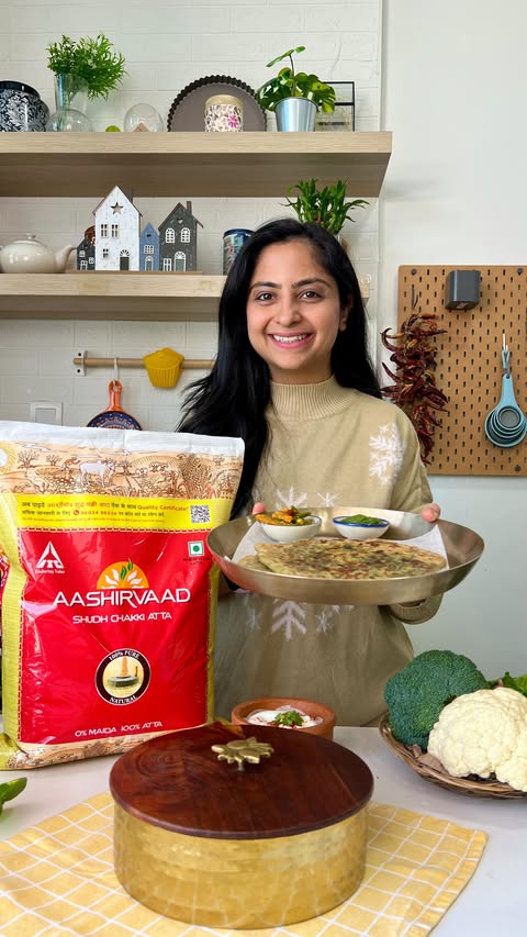 Instagram post by @foodiesonlyofficial for Aashirvaad. Caption reads: Winter special - 4 in 1 Paratha because I wanted....