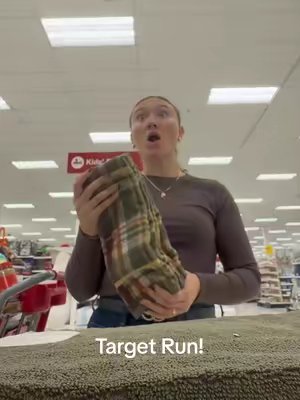 TikTok post by @natashasbookshelf for Blueland. Caption reads: [...] run for your sunday #target @target....