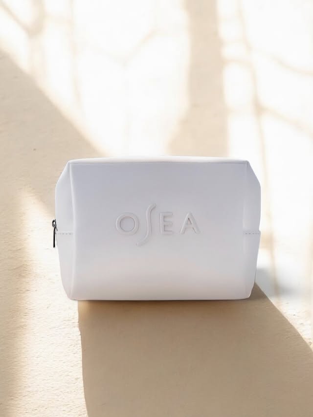 Instagram post by @glowdaily__ for OSEA Malibu. Caption reads: 🎉 Another FREE Gift with Purchase Event is here....