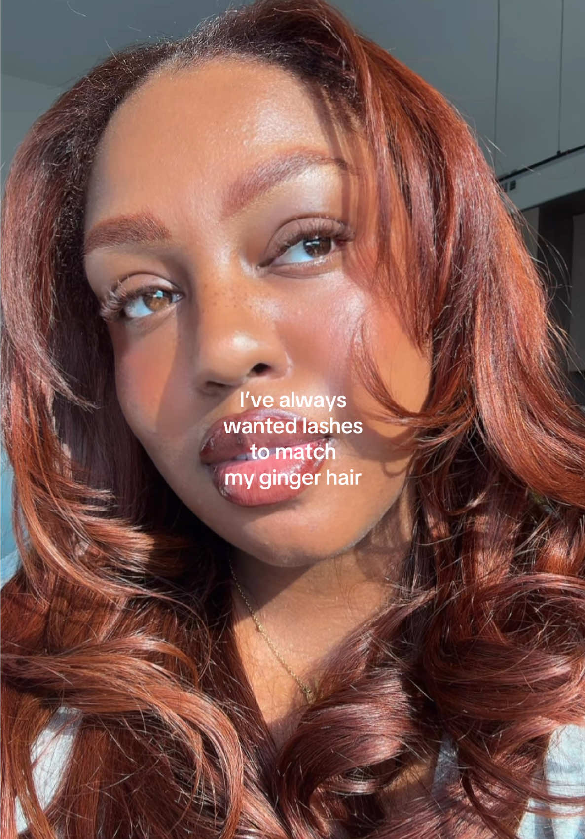 TikTok post by @issadaisyworld for MaxComfi Lashes. Caption reads: @MaxComfi Lashes made my ginger lash come true....