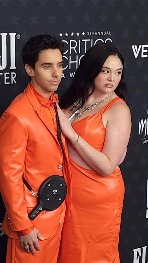 Instagram post by @paulwdowns for Who What Wear. Caption reads: This one’s for Marty. 🧡
video: getty images.