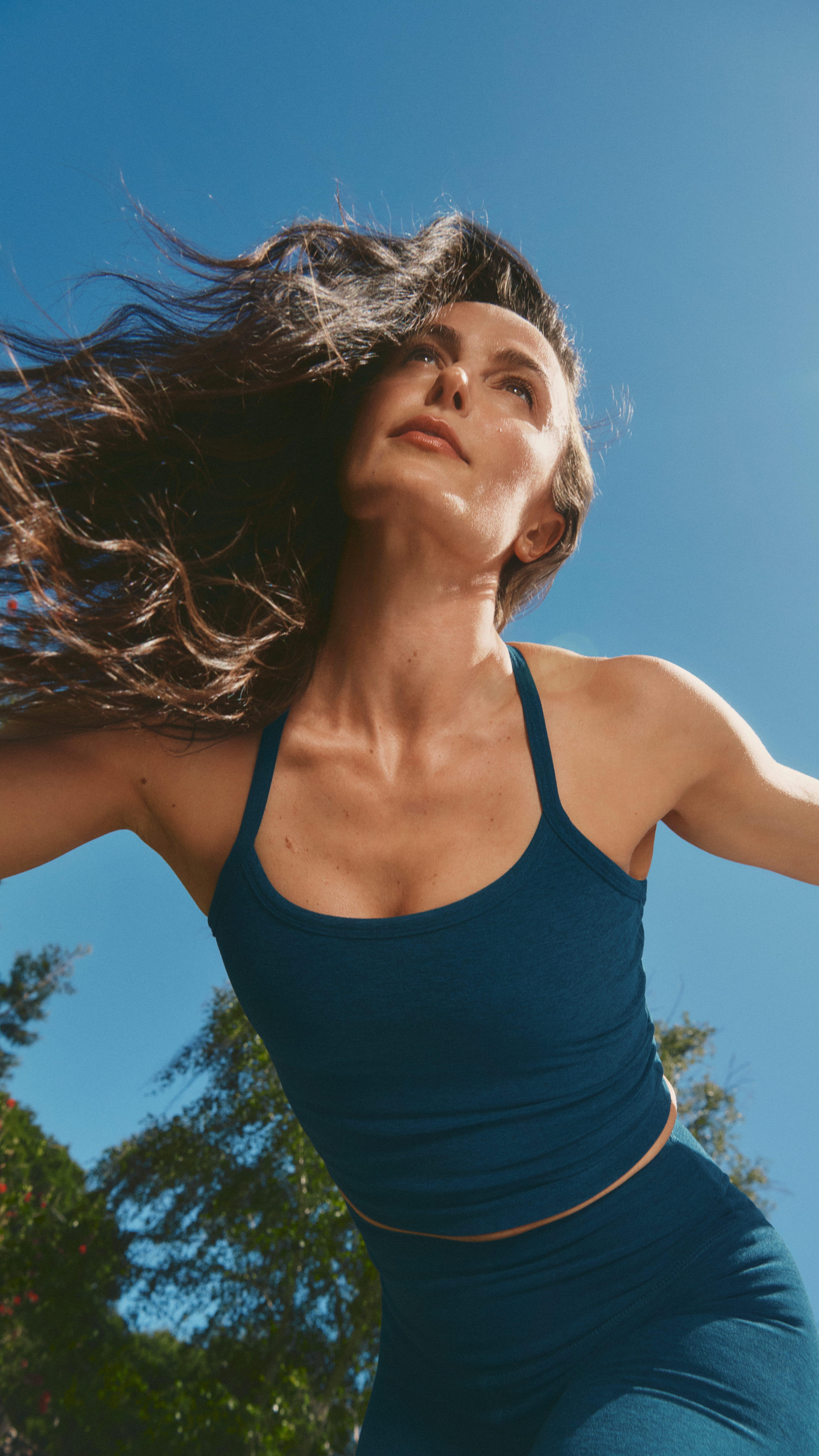 Instagram post by @meganroup for Beyond Yoga. Caption reads: Movement is everything to me. Sharing a little BTS....