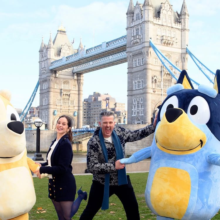 Instagram post by @davidmccormackofficial for Bluey. Caption reads: When Mum met Dad...in London! 🇬🇧💙

UK fans can....