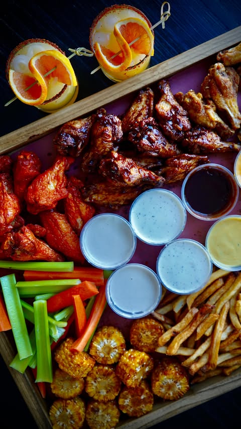 Instagram post by @calwillcookit for Wingstop. Caption reads: [...] Day Appetizer Board brought to you by....