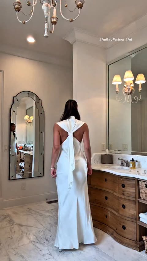 Instagram post by @calidoniomia for Anthropologie. Caption reads: [...] your fav dress you liked best 🤍✨....