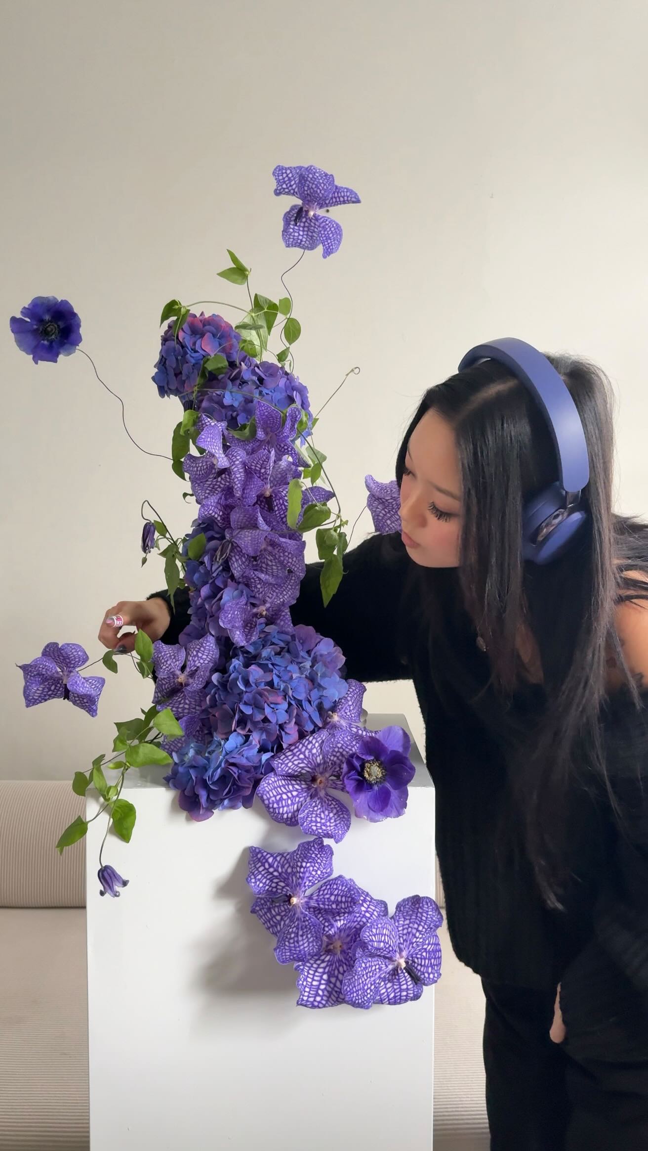 Instagram post by @seeking_floral_arrangements for Bose. Caption reads: Got my headphones on 🫡 Floral arrangement....