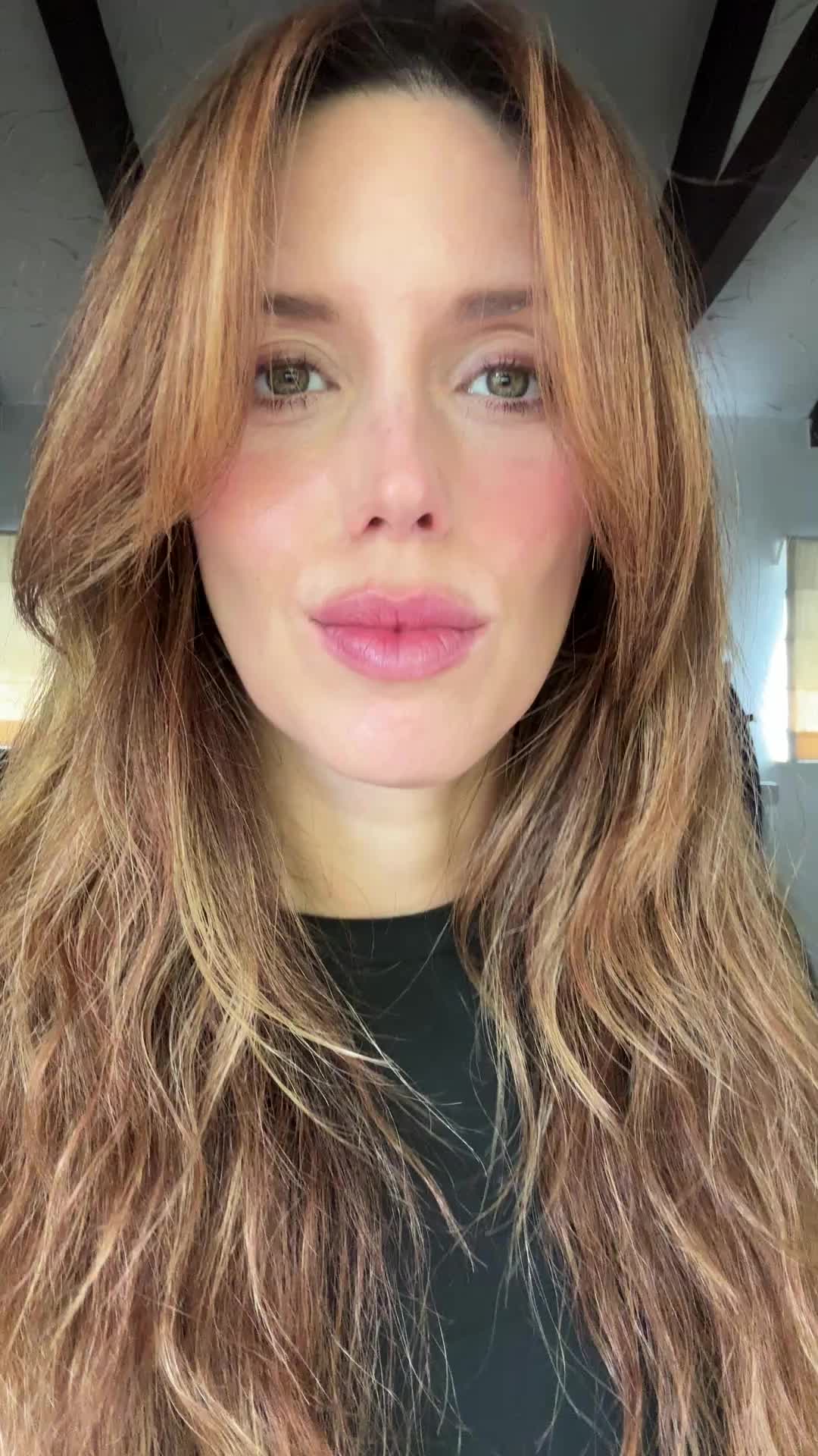 TikTok post by @kayla_ewell for Oribe. Caption reads: used @Oribe Flash Form Finishing Spay Wax.