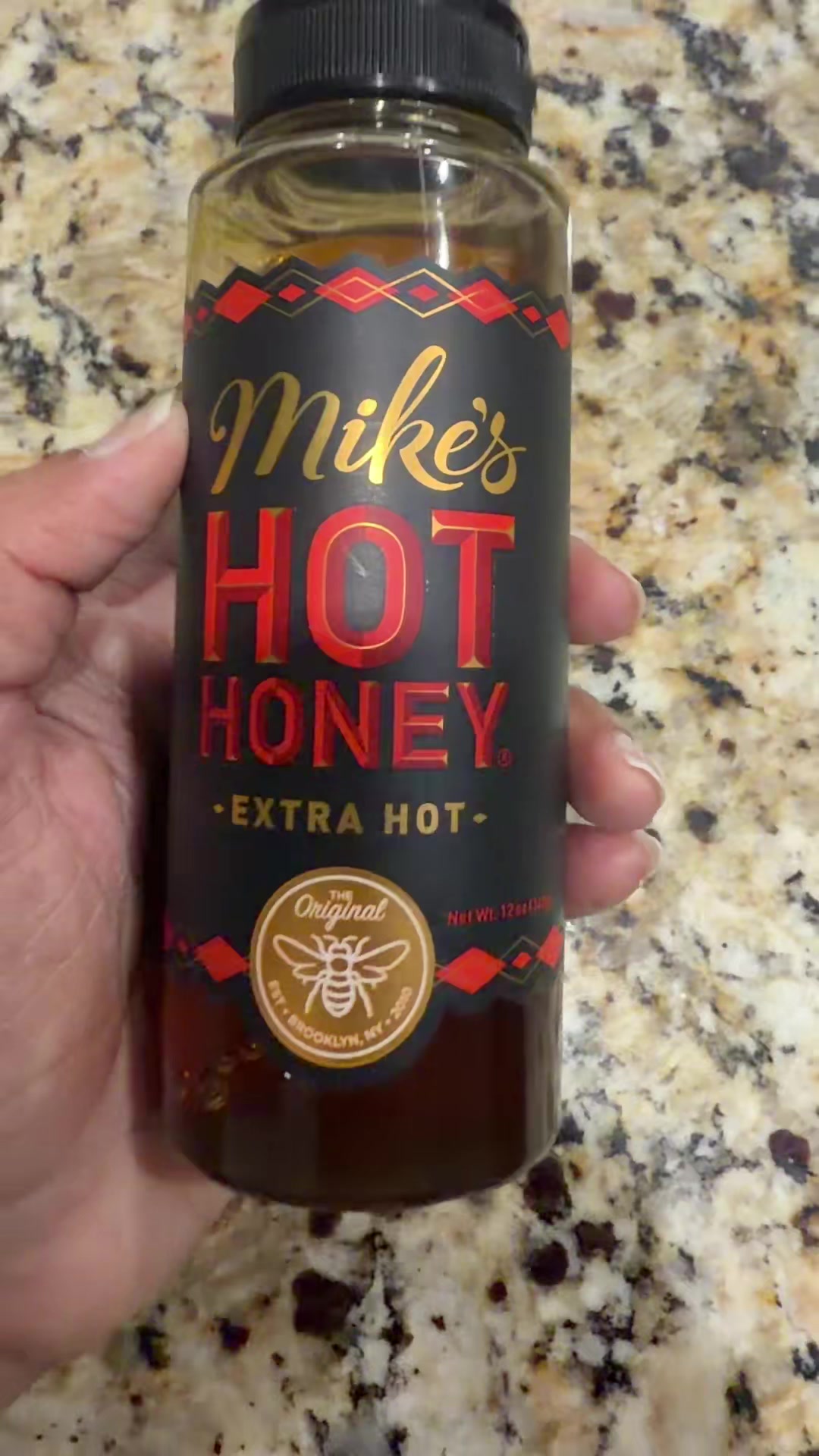 TikTok post by @amisa_patel18 for Mike's Hot Honey. Caption reads: #tiktokmademebuyit #spicy #sweet @Mike’s Hot Honey....
