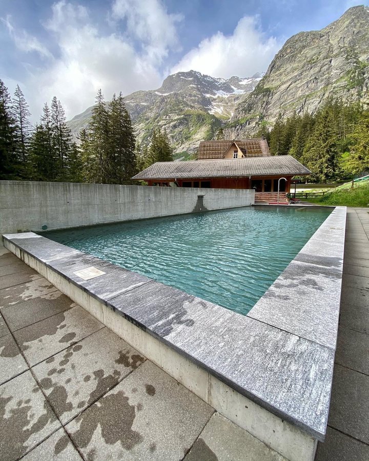 Instagram post by @swissmountainview for Wilderness Culture. Caption reads: @grimselwelt 🏔💦🇨🇭 #powerful #beautiful....