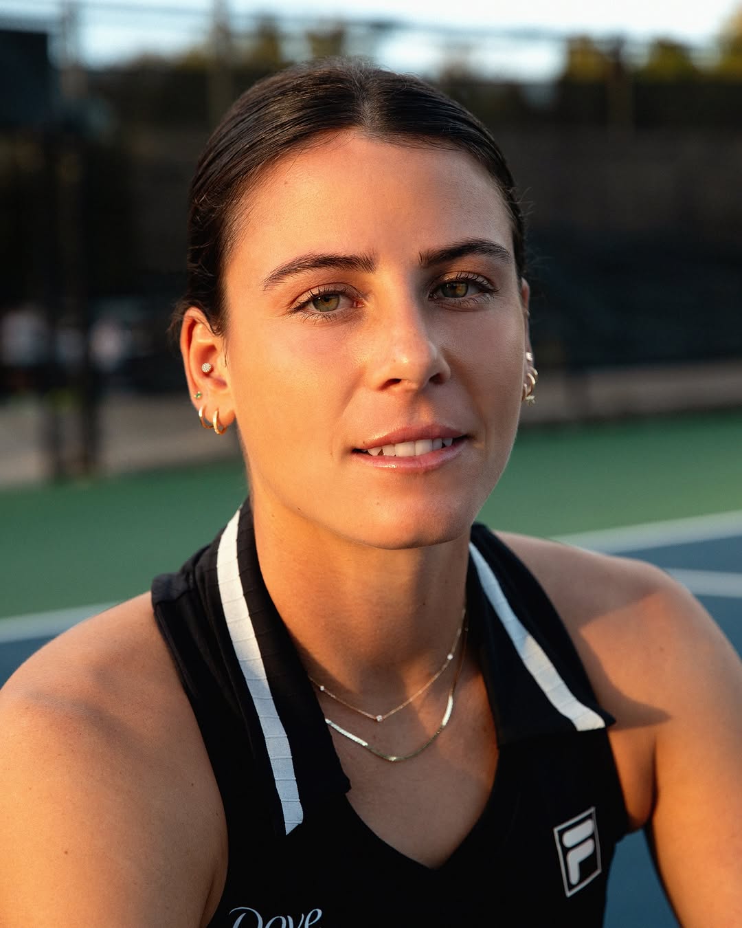 Instagram post by @emma_navarro48 for Mejuri. Caption reads: Tennis star Emma Navarro has a lucky charm, and....