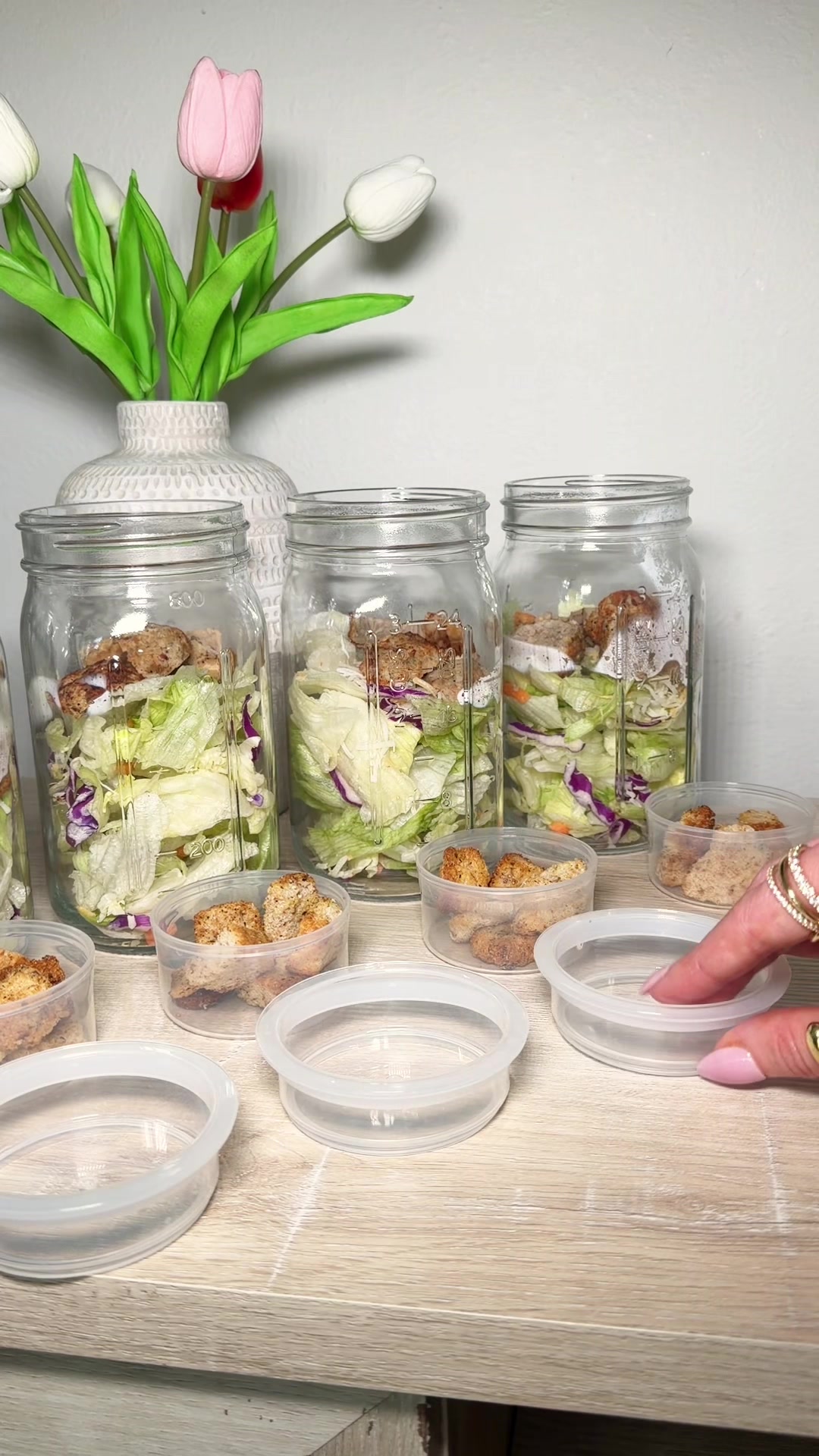 TikTok post by @realtalkcaitlin for Soligt. Caption reads: [...] make meal prepping salads a breeze 🥗🫙....