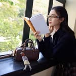 Instagram post by @liuhaocunlhc_ for Miu Miu. Caption reads: Read📚@miumiu
#MiuMiu
#MiuMiuClub.