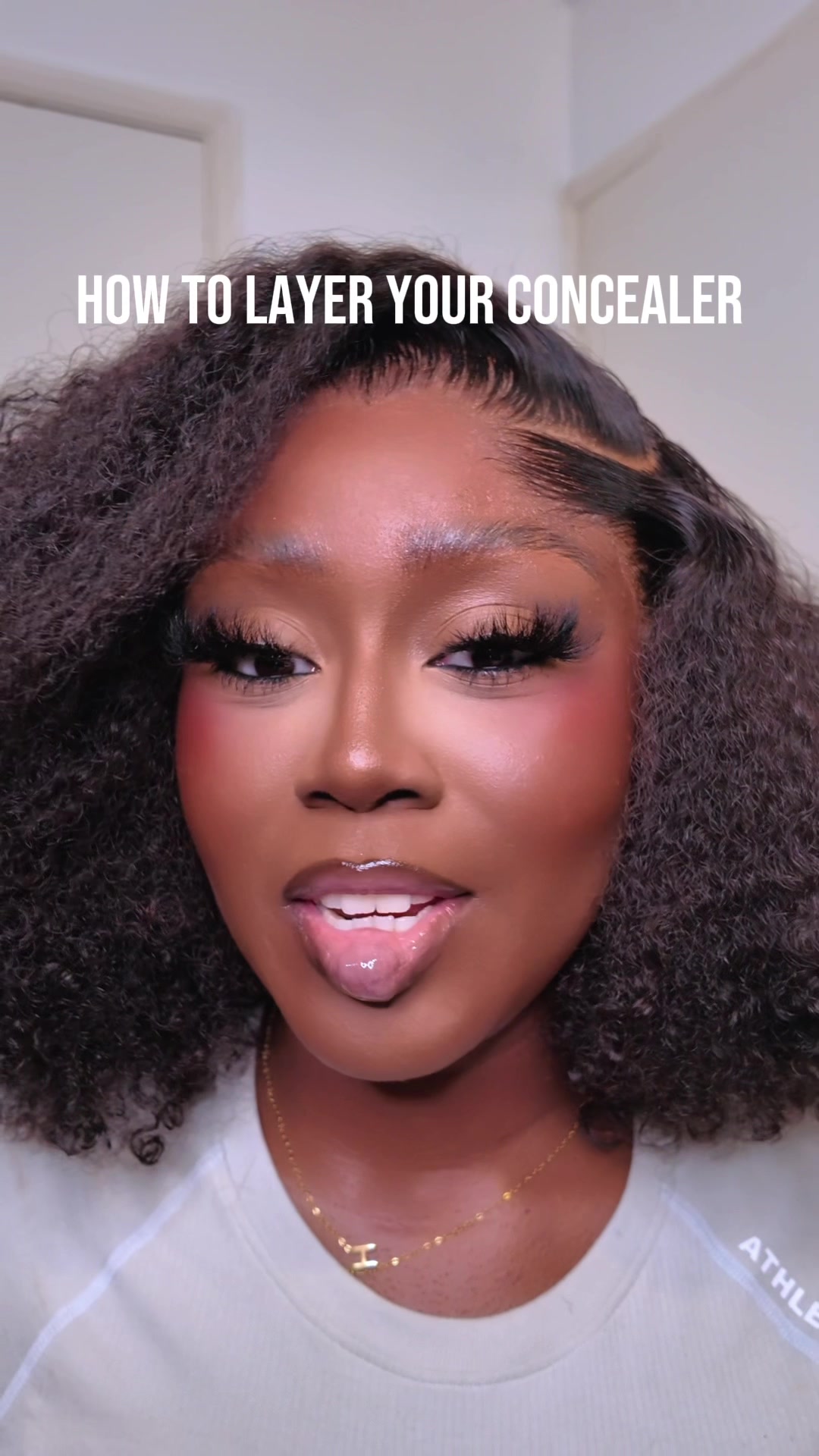 TikTok post by @1mads for HNB Cosmetics. Caption reads: how to layer your concealer for the perfect bright....
