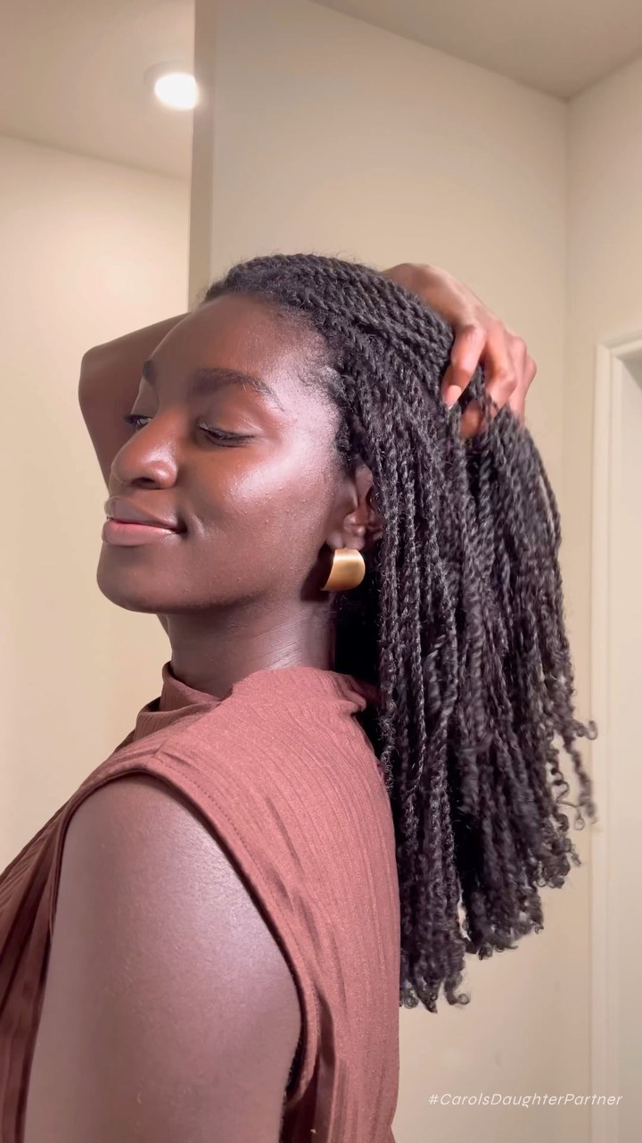 Instagram post by @anima.agyeman for Carol's Daughter. Caption reads: It’s mini twists season againnn! What is your....