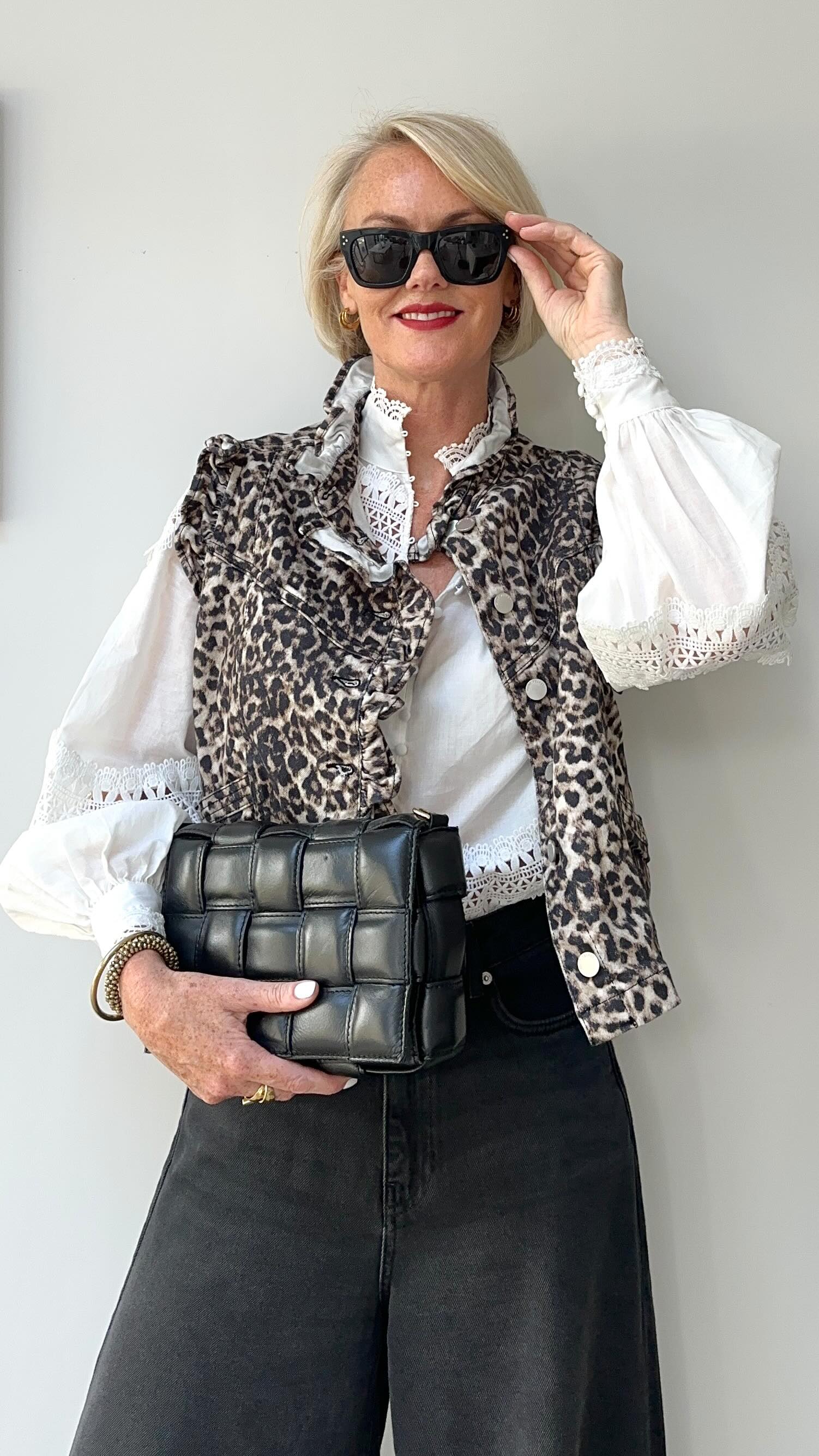 Instagram post by @stripeycoral for DuoBoots. Caption reads: Get ready with me wearing a leopard print gilet....