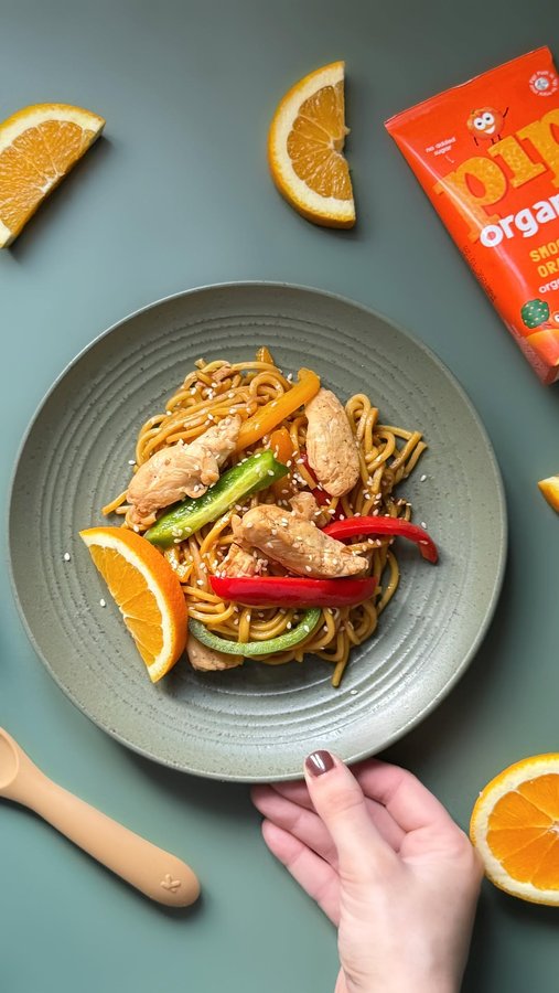 Instagram post by @tinytumsrecipes for Pip Organic. Caption reads: Orange chicken stir fry 🍊 
Cough and cold season....