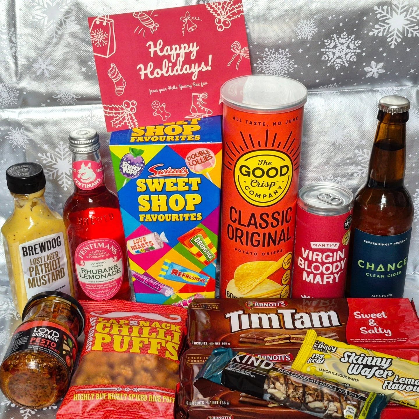 Instagram post by @thatanxiousfoodiegirl for Hello Yummy Box. Caption reads: ❄️ December @helloyummybox.uk ❄️

*....