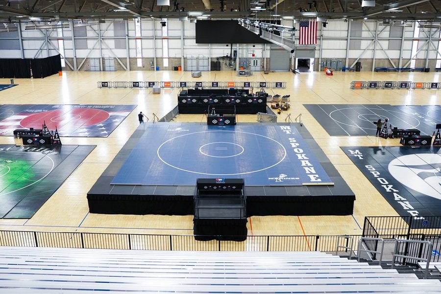 Instagram post by @usawrestling for Marines. Caption reads: ’Twas the night before Nationals, and all through....