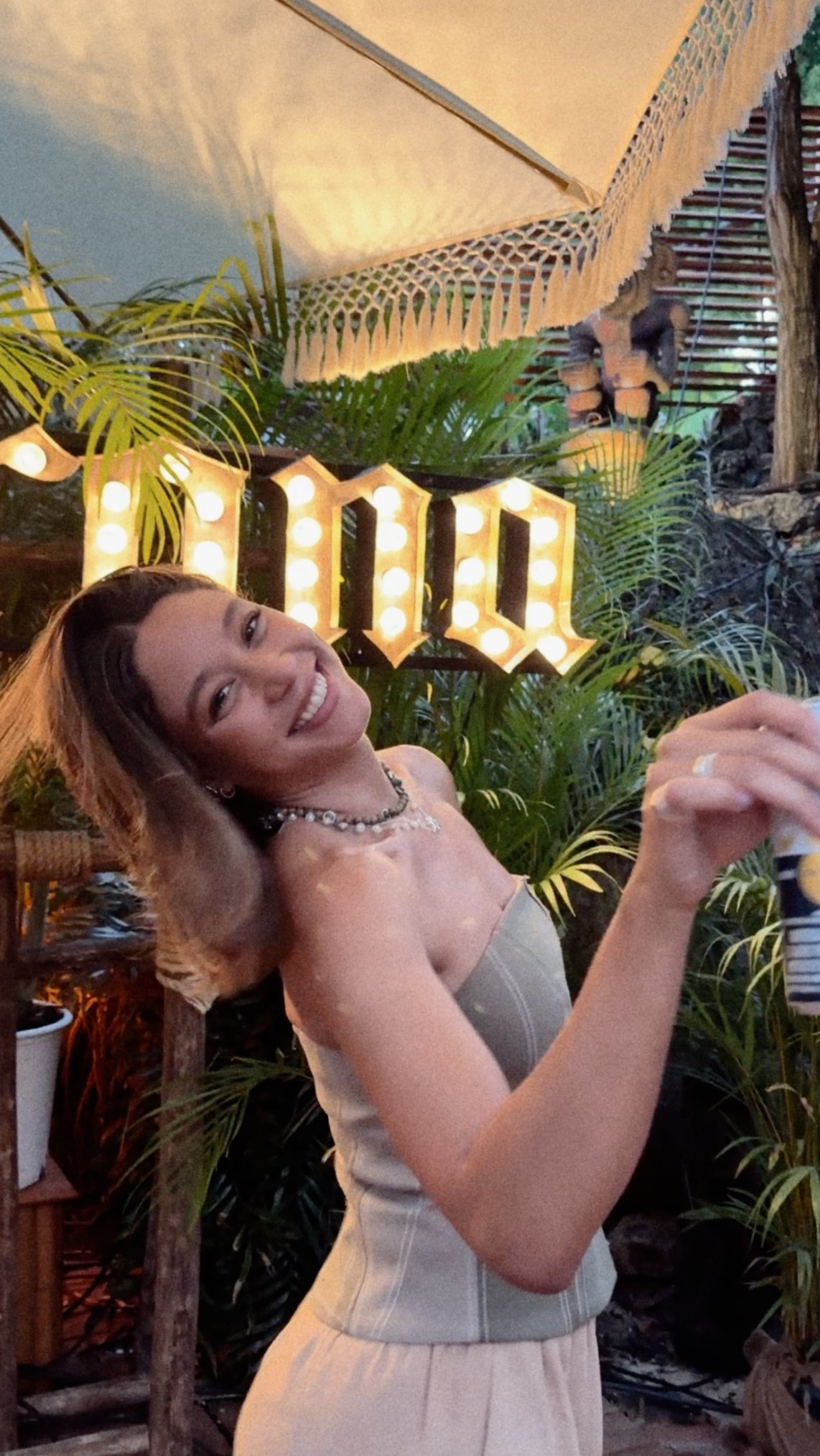 Instagram post by @stephany.liriano for Corona. Caption reads: Mi Casa es Tu Casa, Casa Corona 🍻

Outfit:....