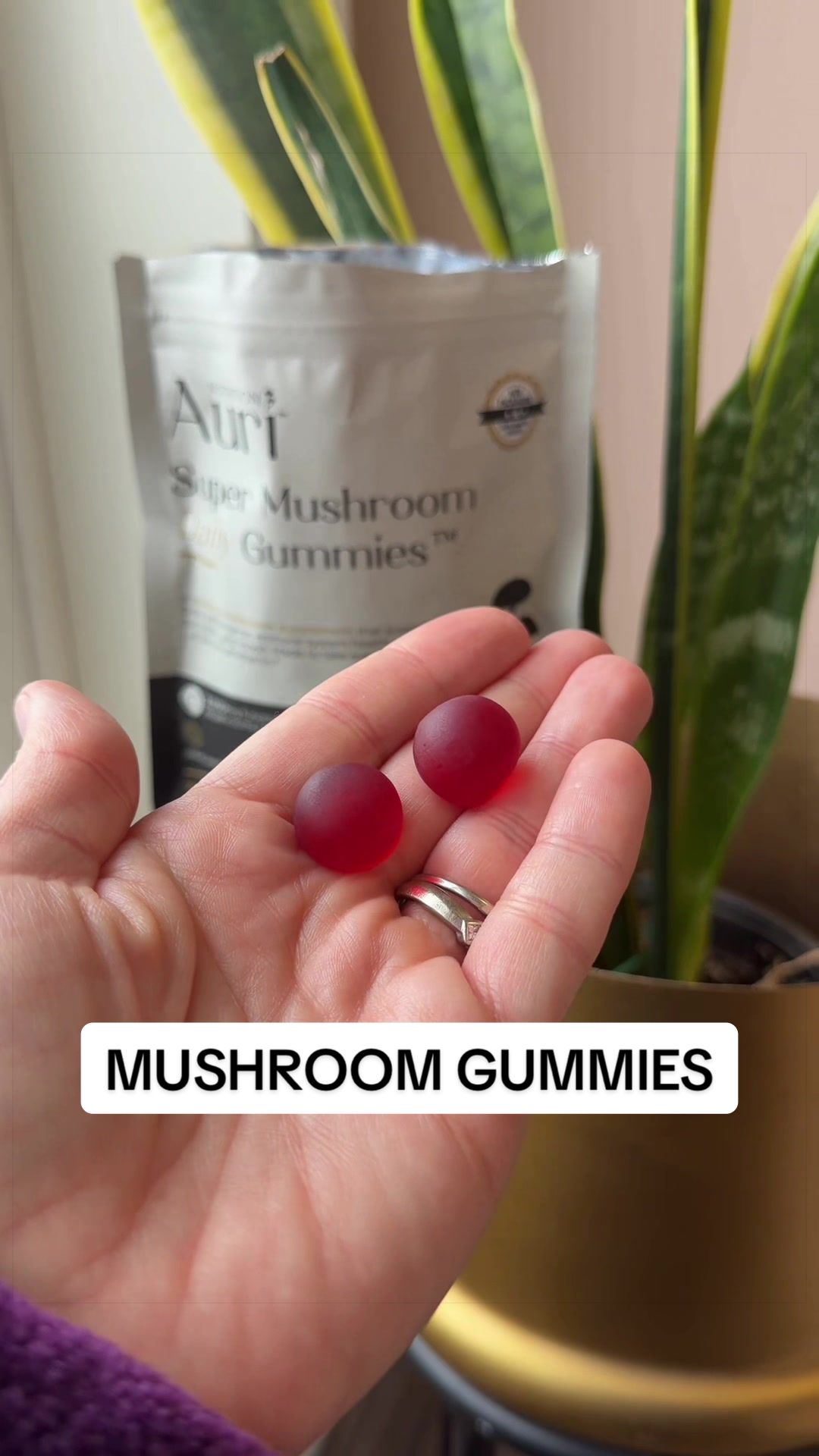 TikTok post by @thereal.katiejo for Auri Nutrition. Caption reads: [...] better memory, more motivation 🍄 @Auri....