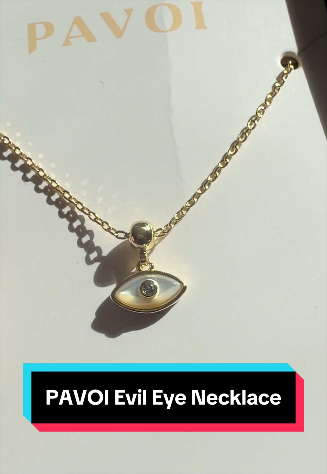 TikTok post by @linzatic for Pavoi. Caption reads: [...] mother of pearl evil eye necklace is!🧿....