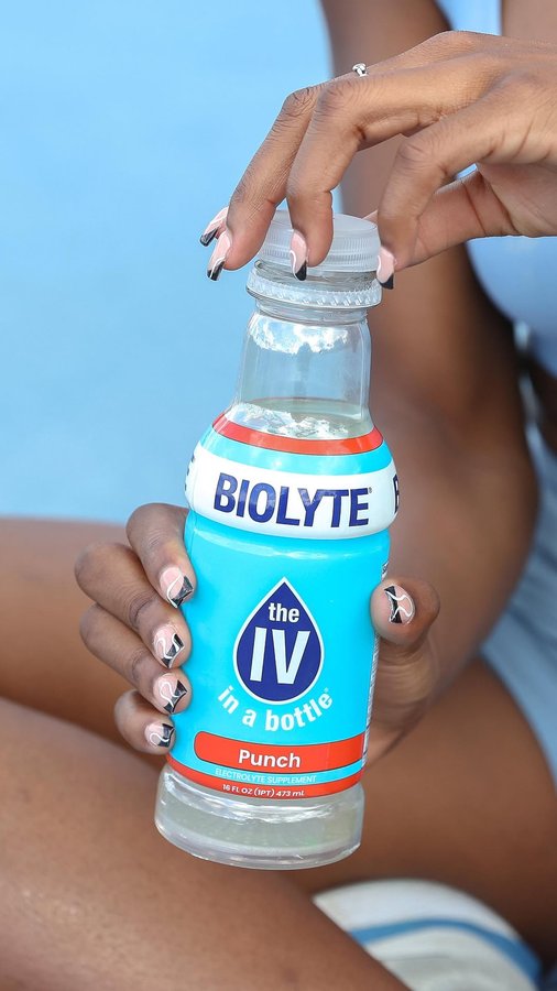 Instagram post by @india_alix_ for BIOLYTE. Caption reads: @drinkbiolyte has given me a solid boost to aid in....