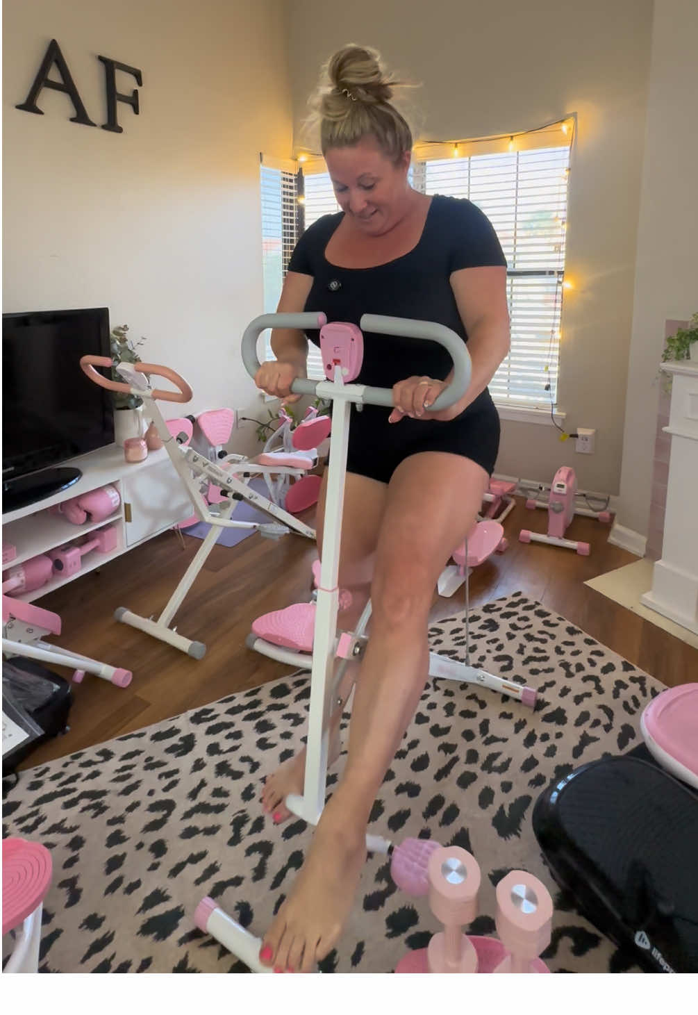 TikTok post by @pinkafgirl for Sunny Health & Fitness. Caption reads: The many ways to use your @SunnyHealthFitness....