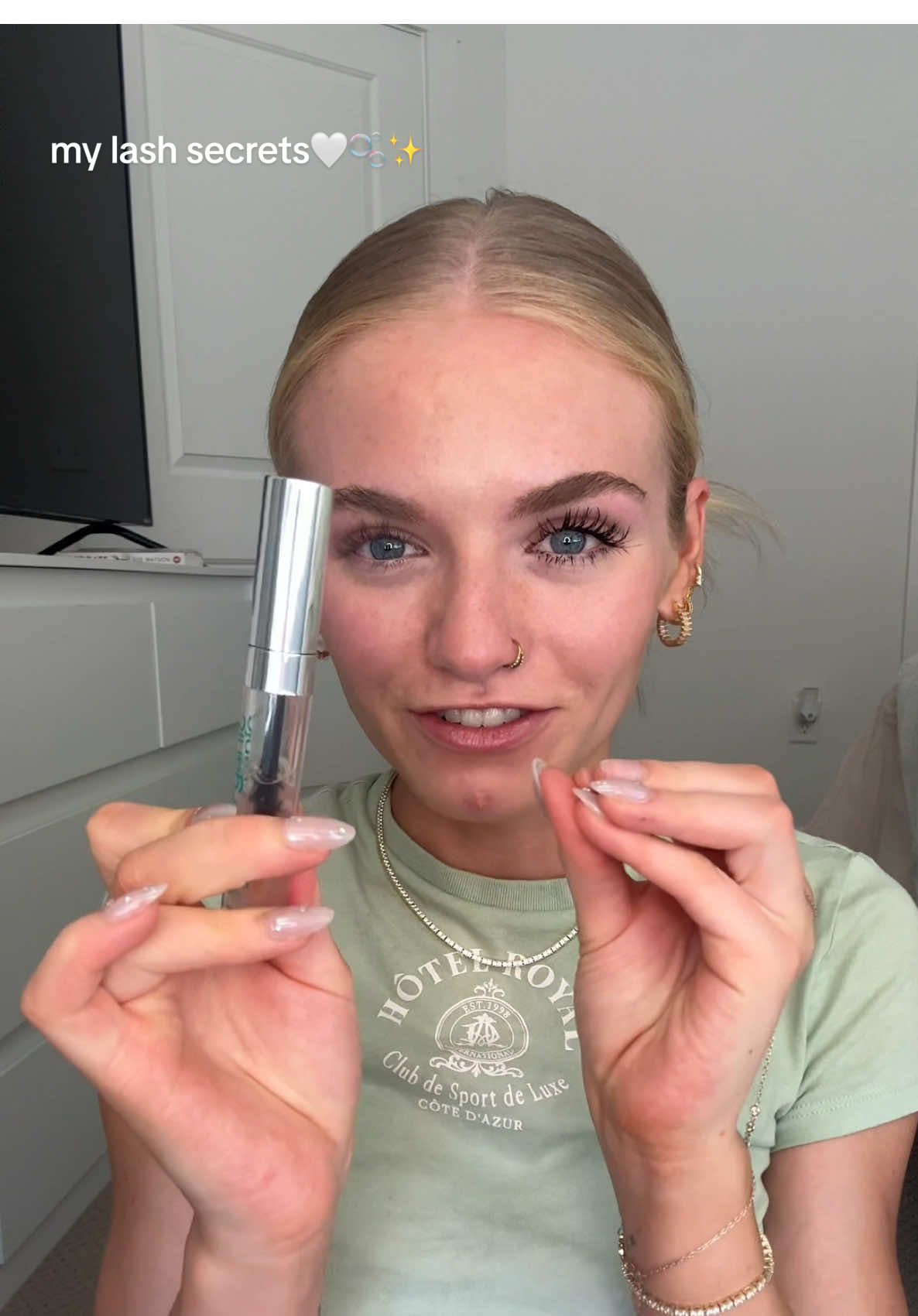 TikTok post by @miss.kenzienicole for Nuorganic. Caption reads: i swear by this one #nuorganic #lashserum #lashes....