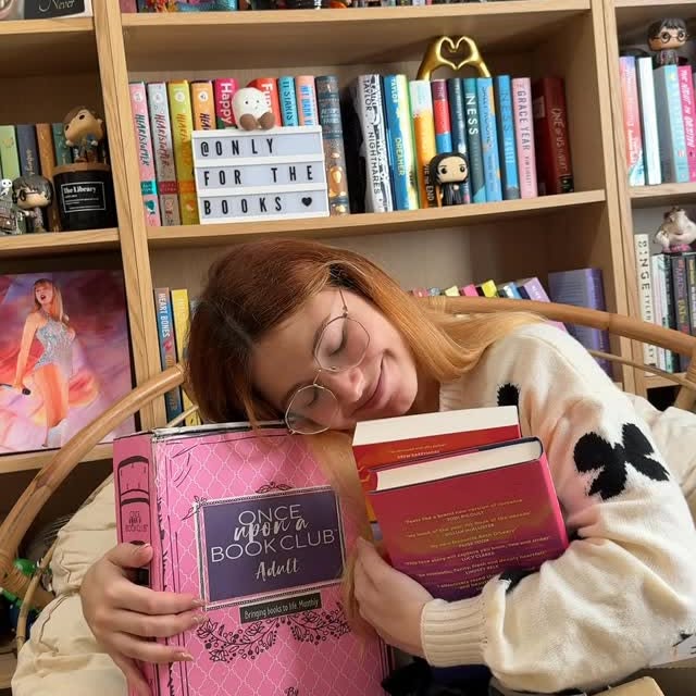 Instagram post by @onlyforthebooks for Once Upon A Book Club. Caption reads: [...] hands on these two beauties and my....