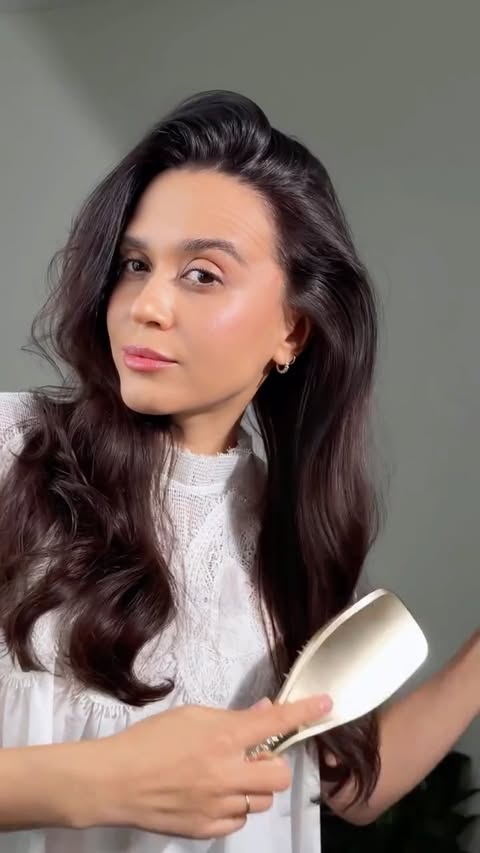 Instagram post by @creator.natalie for CXS. Caption reads: @aveda Tousle Texture Dry Texture Spray....