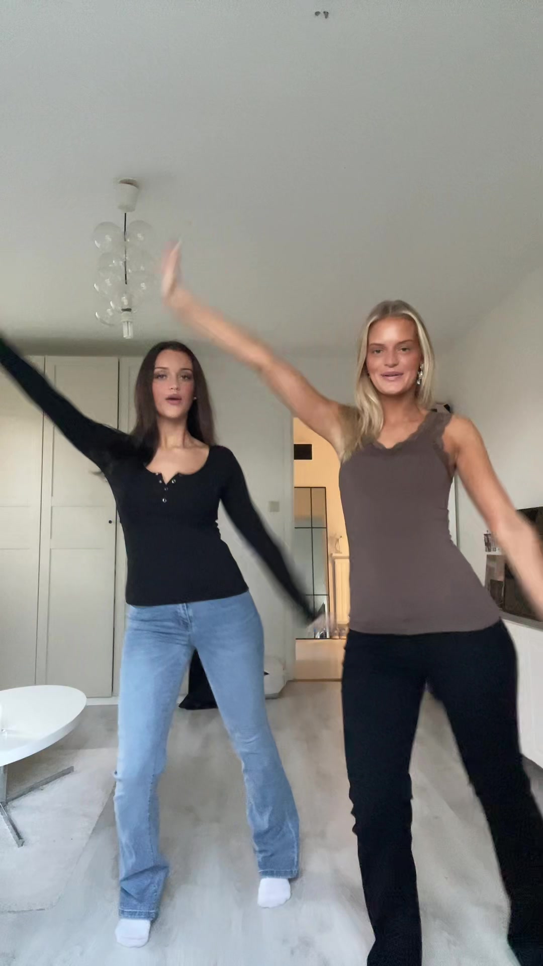 TikTok post by @isaandnina for Nelly. Caption reads: In paid collaboration with Nelly.com 🩷 Black week....