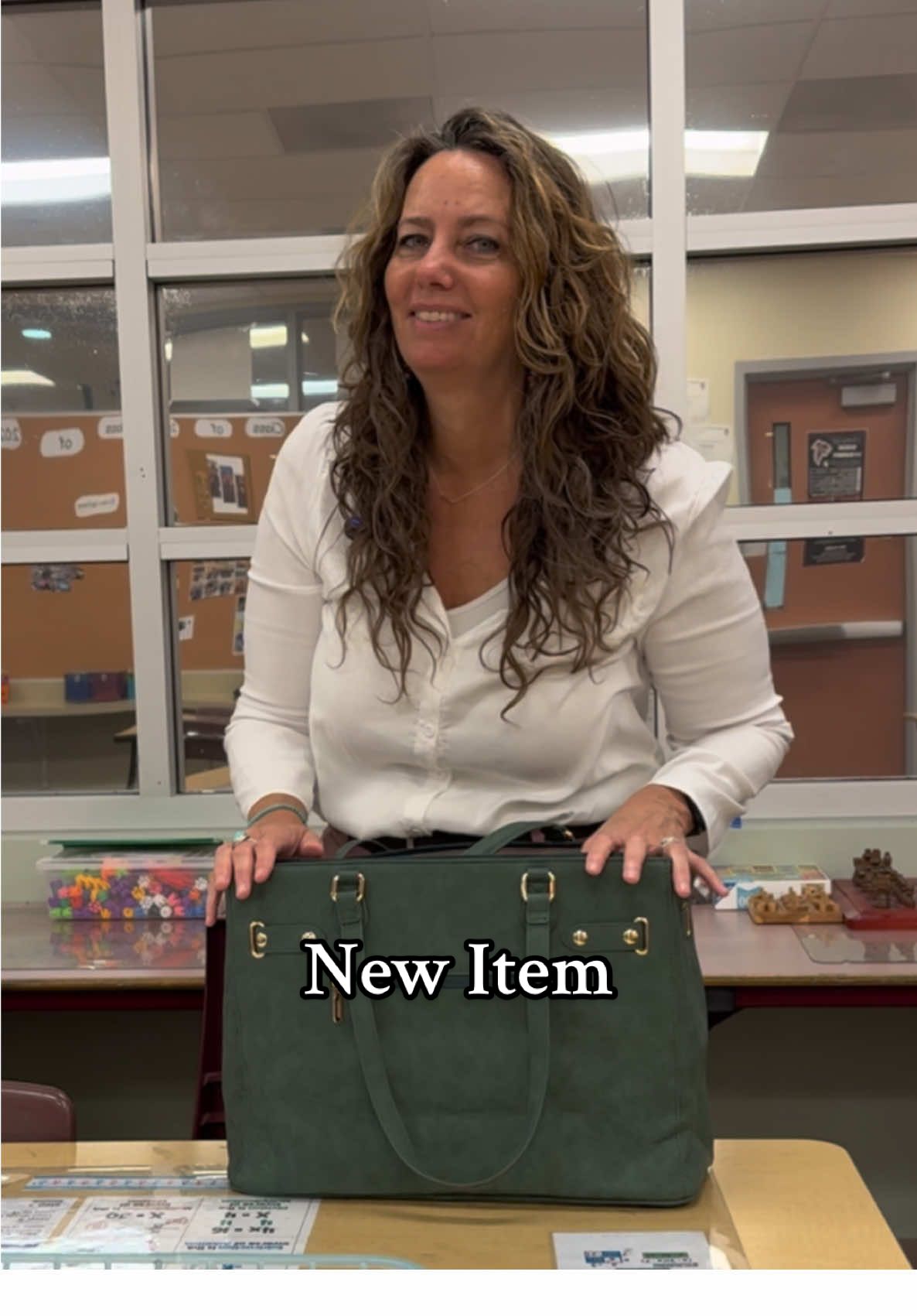 TikTok post by @hustleandteach2 for Lovevook. Caption reads: Laptop Tote Bag @Lovevook Bags come in sizes 15.6....