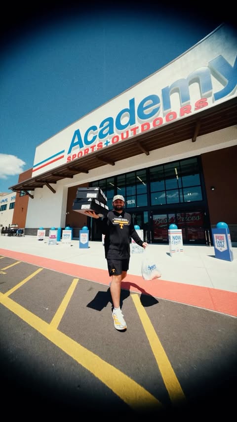 Instagram post by @noah_the_boa12 for Academy Sports + Outdoors. Caption reads: Day in the Life: Fall Camp Edition ⛺ Head to....