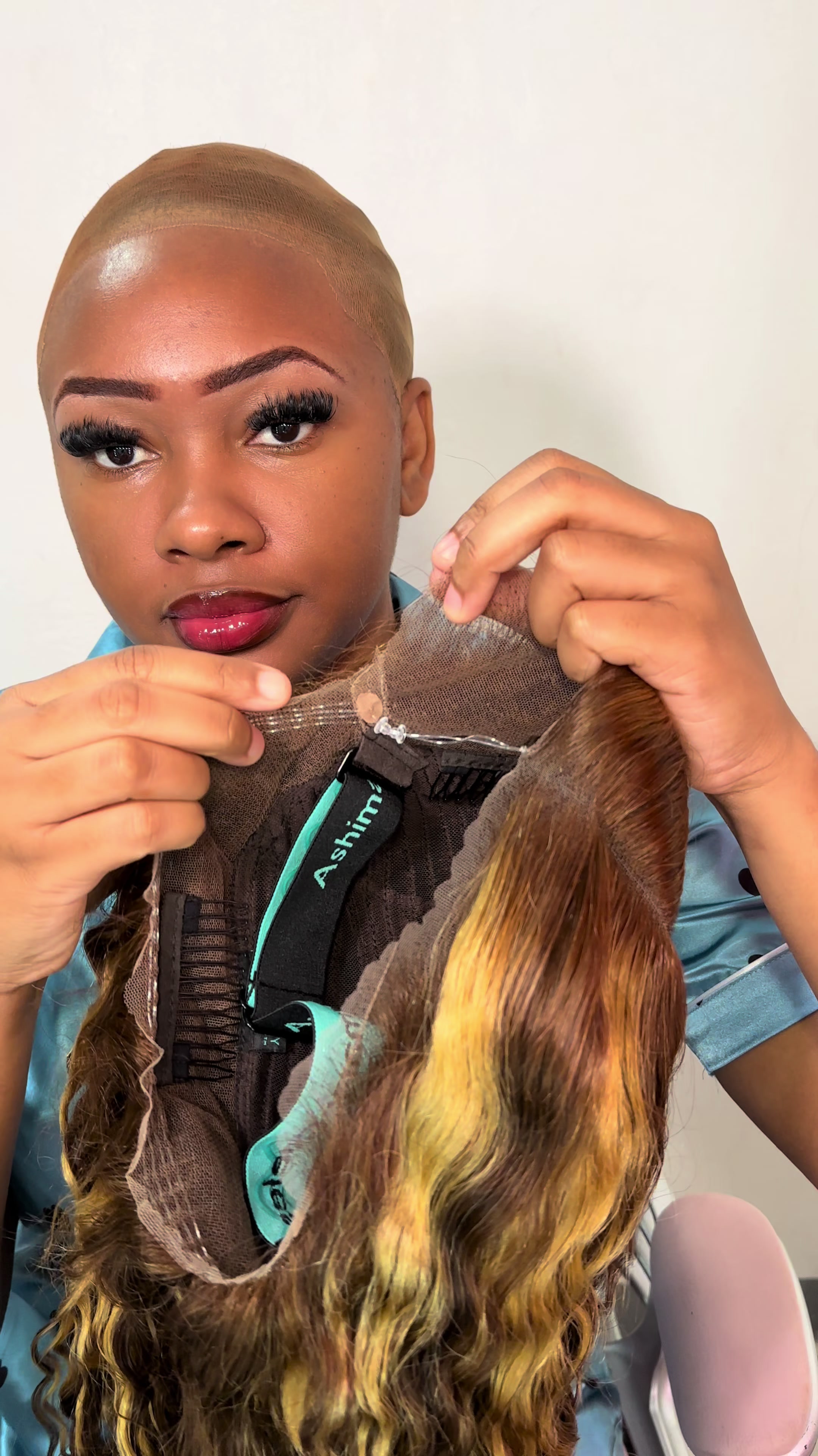 TikTok post by @shawdii_sharii for Ashimary Hair. Caption reads: Y’all think this wig eat down from @Ashimary Hair....