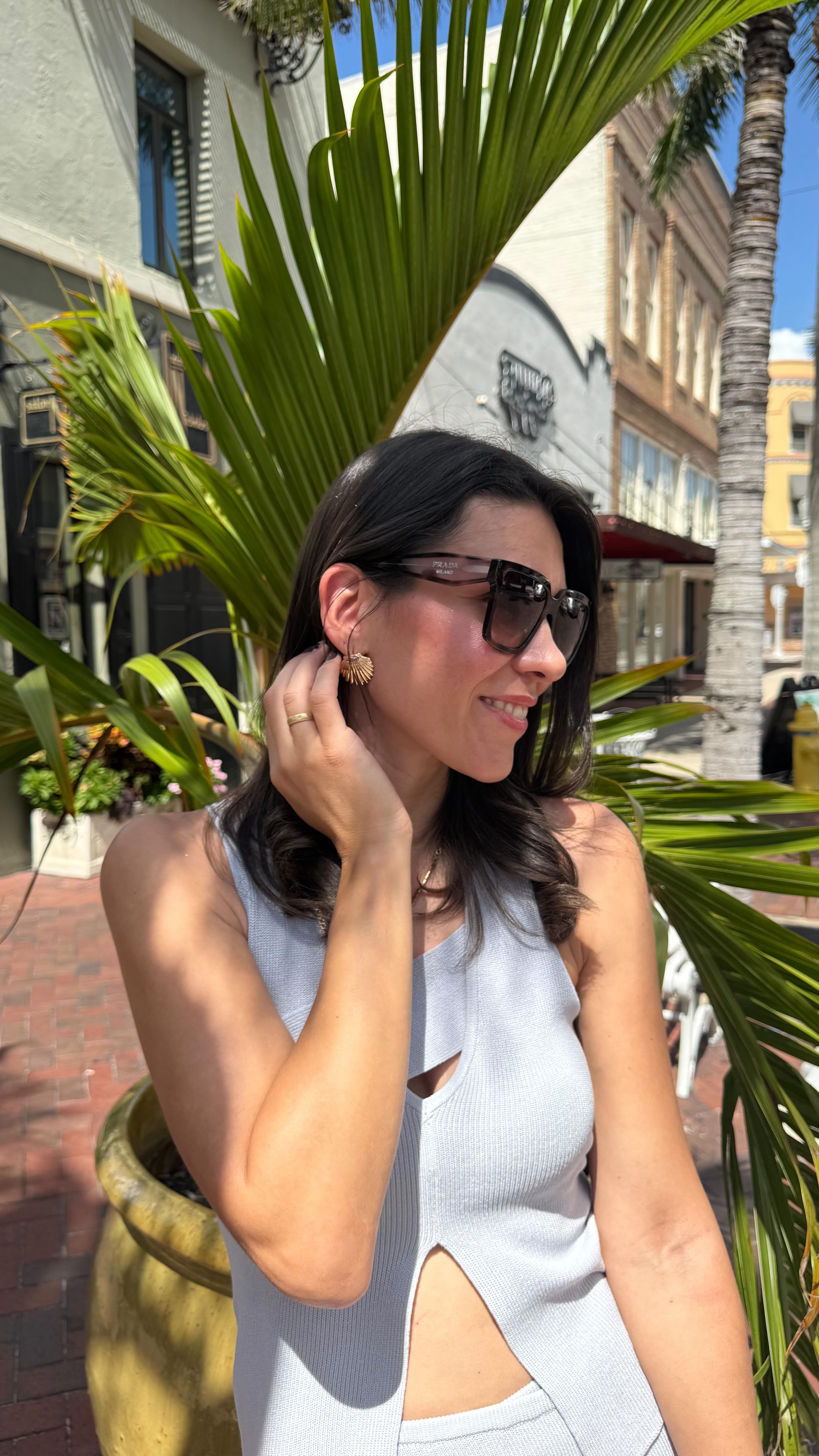 Instagram post by @myusalifee for SmartBuyGlasses. Caption reads: Effortlessly chic under the sun ☀️
Timeless....