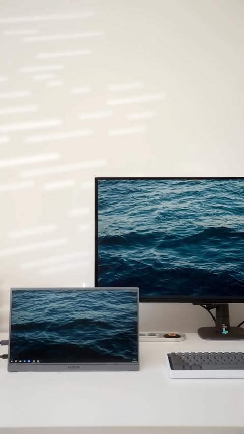 Instagram post by @borisgtech for ARZOPA. Caption reads: Why does this portable monitor hit so hard....