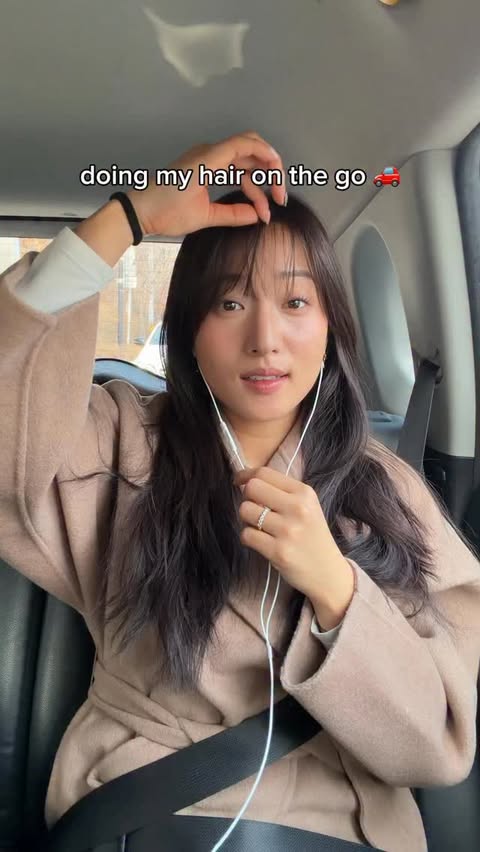 Instagram post by @sallykim7 for Oribe. Caption reads: [...] backs when i have a bad bangs day 🫣 @oribe....