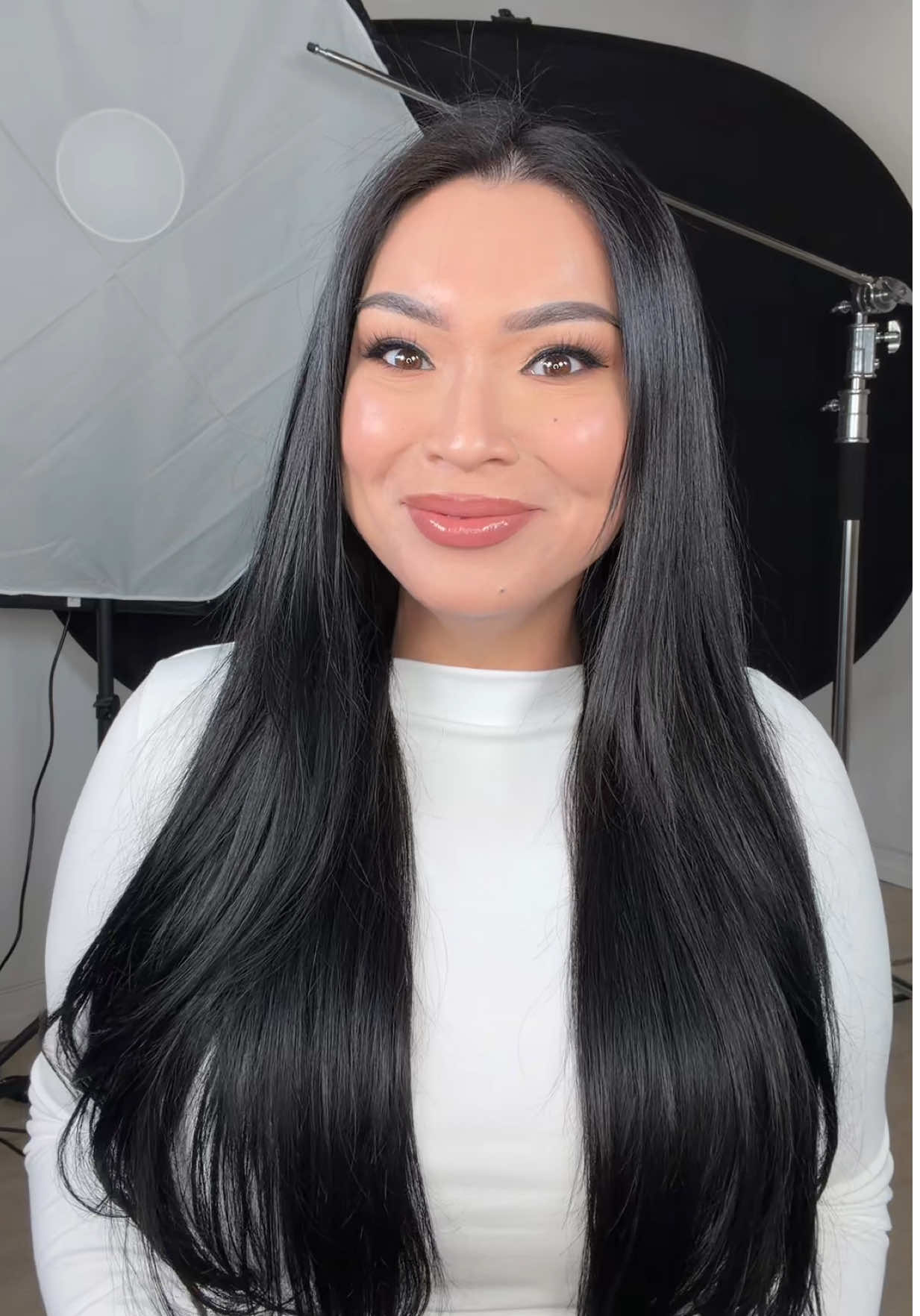 TikTok post by @glamzilla for BELLAMI Hair. Caption reads: If you’ve been here a few years, you know the hair....