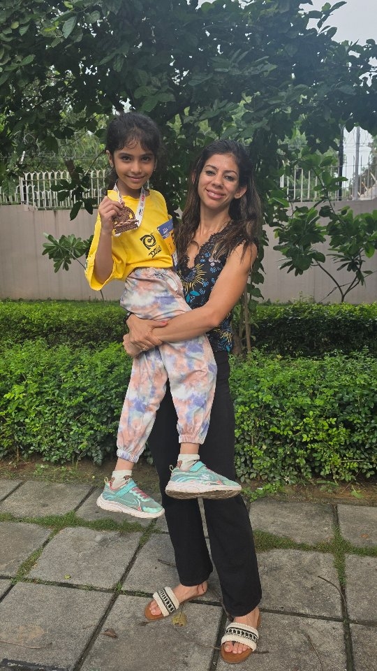 Instagram post by @thrivewithmegha for Asics. Caption reads: Trained by @thrivewithmegha 6yrs old....