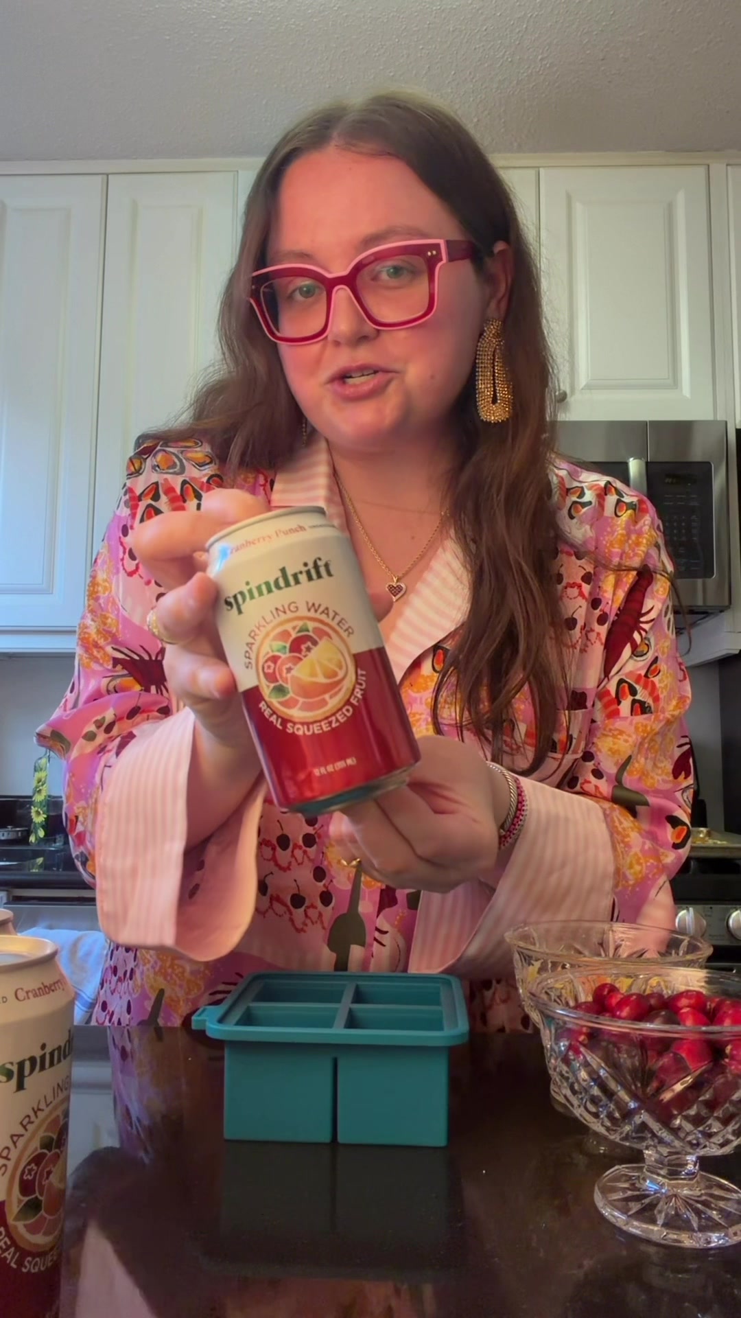 TikTok post by @acrosskrissystable for Spindrift. Caption reads: My perfect holiday cocktail bar with @Spindrift....