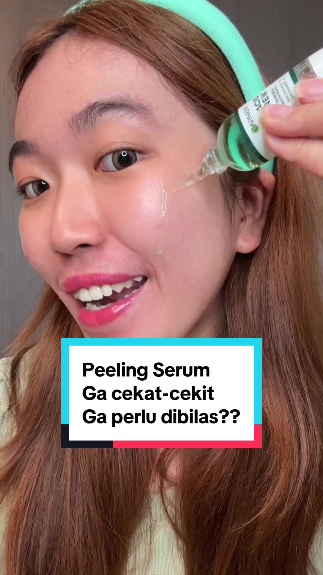 TikTok post by @jessbandit for Garnier Indonesia. Caption reads: WAJIB PUNYA! Garnier Tri Acid Peeling serum ini....