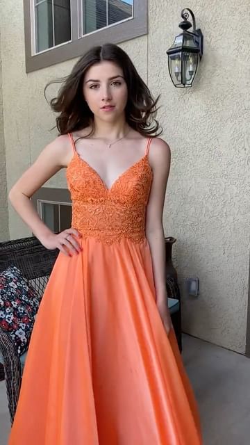 Instagram post by @thelilyspinner for InfluenceHer Collective. Caption reads: Dress #two from last year’s prom. I really love....