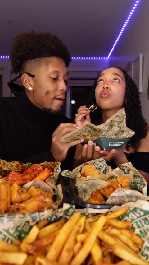 Instagram post by @ayosafespace for Wingstop. Caption reads: All the food in the world and EJ chose wingstop....