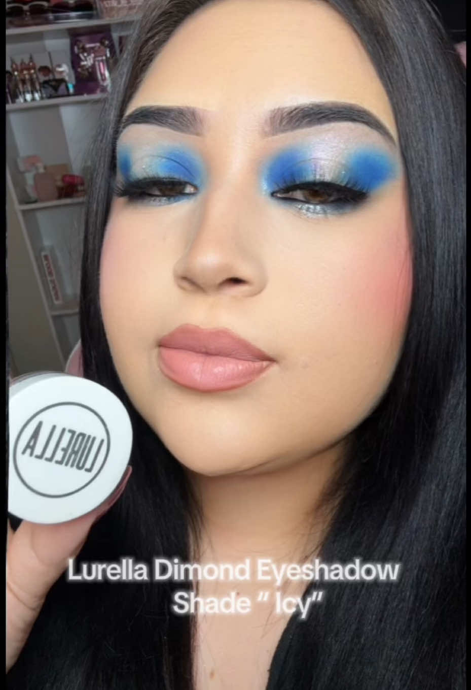 TikTok post by @glamby_xtina for Lurella Cosmetics. Caption reads: [...] #GlitterEyes #MakeupObsessed #y2k....