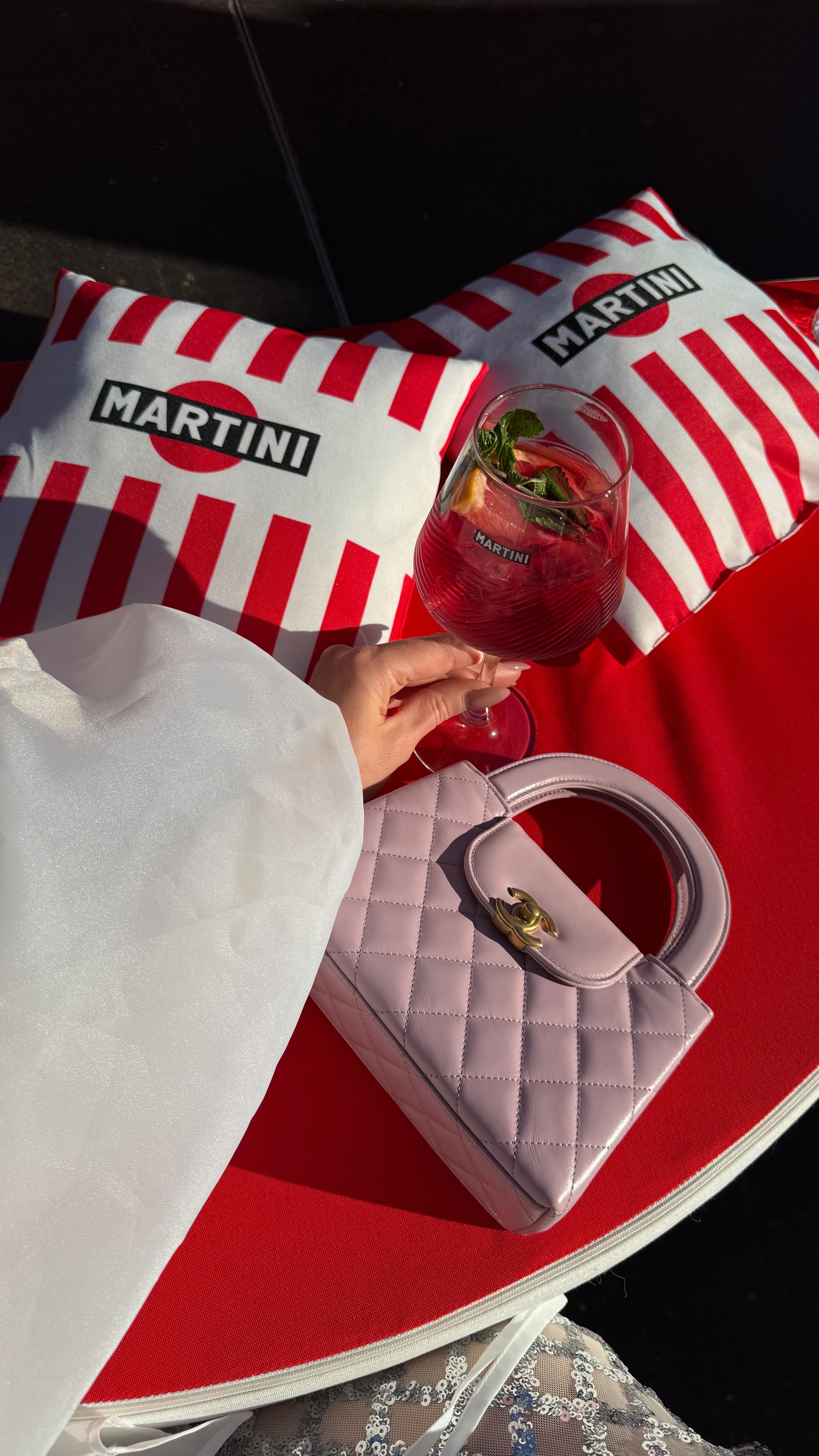 Instagram post by @fashion.style.iryna for MARTINI. Caption reads: @fashionweekberlinofficial in style with....