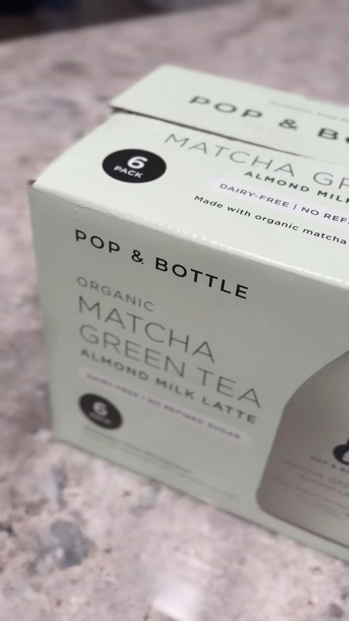 Instagram post by @sparklystrandsofglitter for Pop & Bottle. Caption reads: Pop, pour, and sip! 🌿 This organic bottle of....