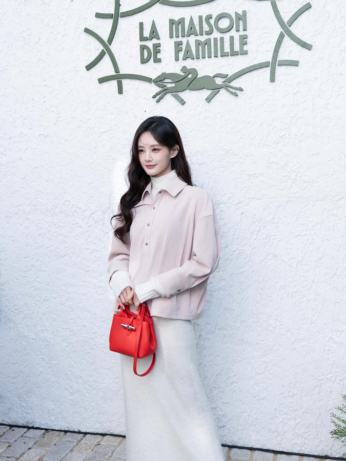 Instagram post by @yitong906.li for Longchamp. Caption reads: longchamp Family Home🩷  @longchamp ....