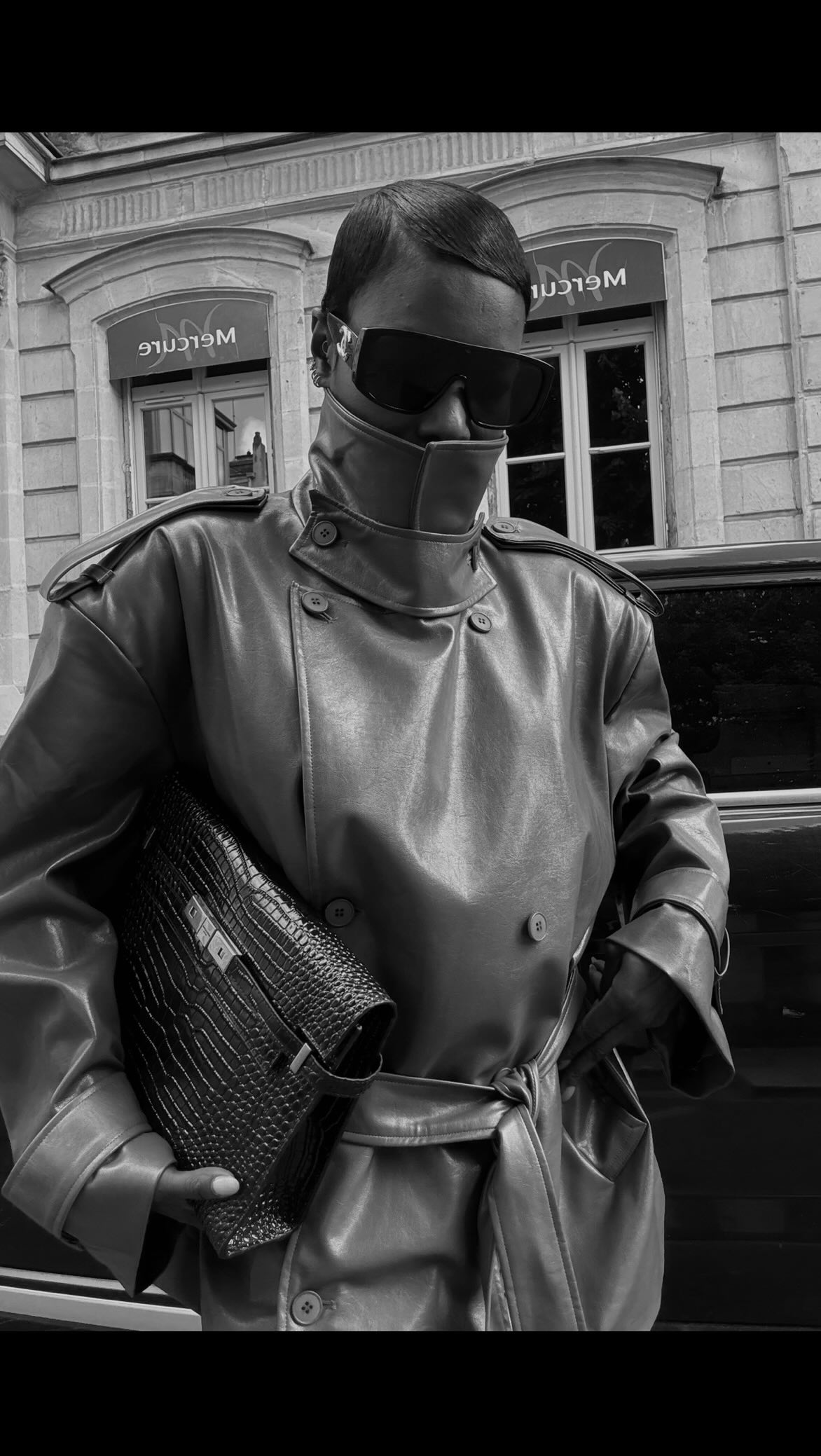 Instagram post by @nafybellaa for Source Unknown. Caption reads: @sourceunknown_official 🤍🖤.