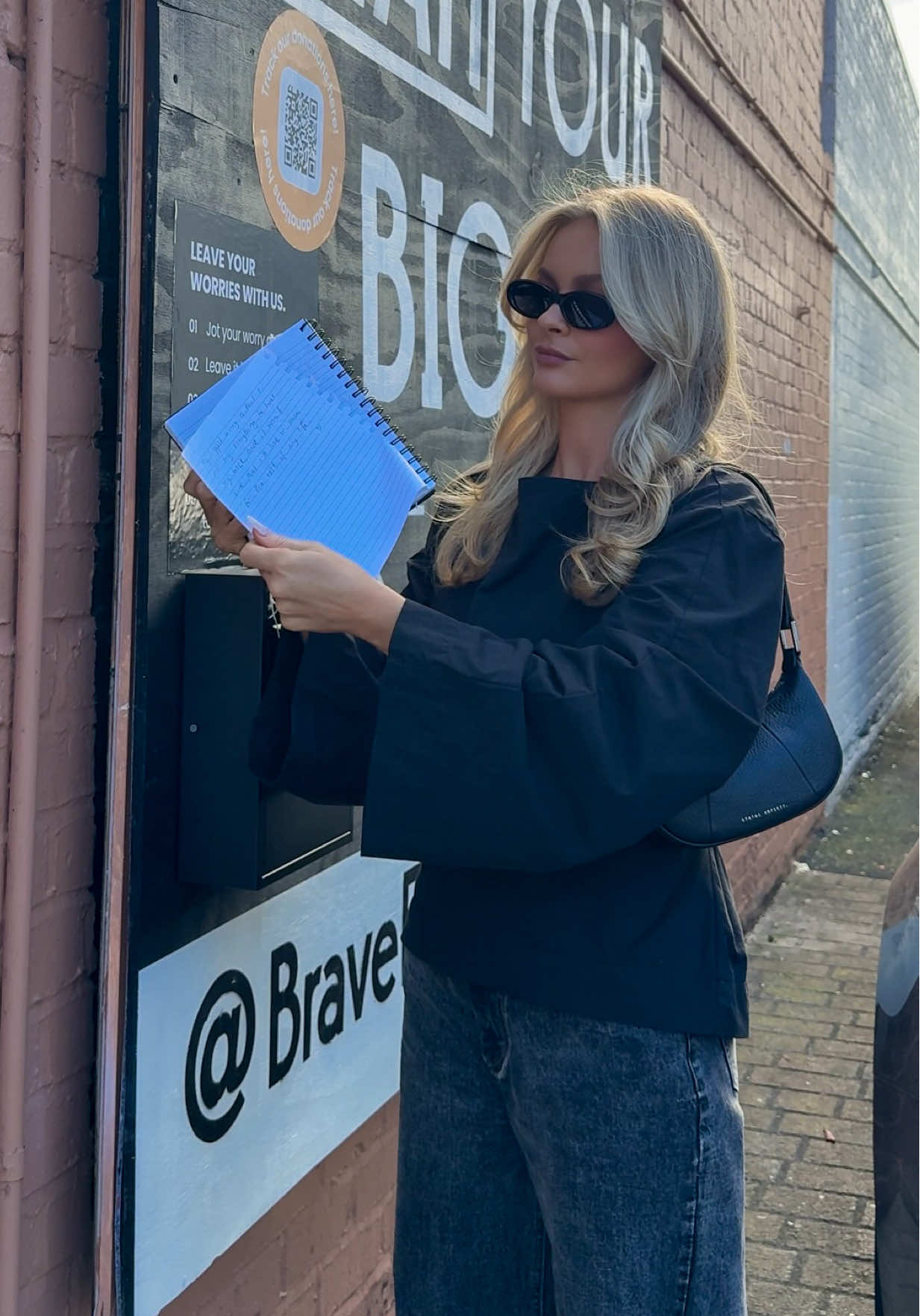 TikTok post by @brit_cunningham for BraveFace. Caption reads: ad Offloading my worries at the @BraveFace Worry....