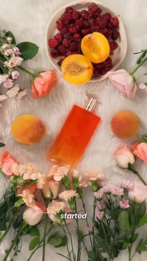 Instagram post by @huda_thamanna for Lancôme. Caption reads: #AD Serving peach, roses & a whole lot of main....